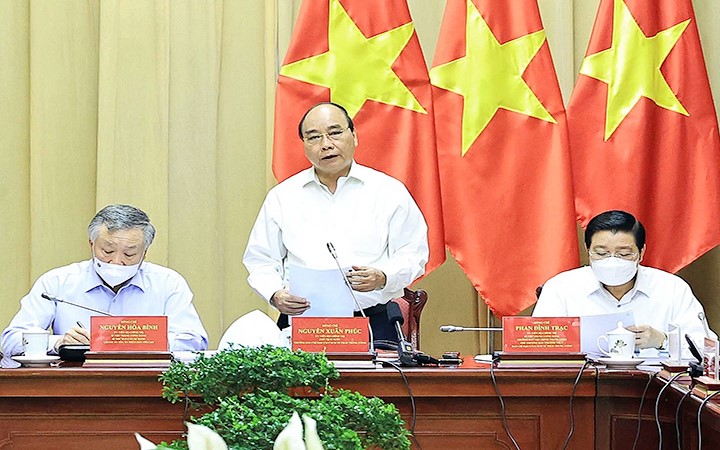 Chủ tịch nước Nguyễn Xuân Phúc phát biểu tại buổi làm việc với Ban Cán sự đảng Tòa án nhân dân tối cao. Ảnh: THỐNG NHẤT (TTXVN) 